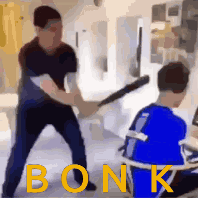 a blurry picture of a man holding a bat with the word bonk in yellow letters
