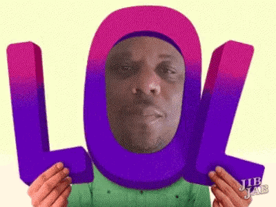 a man with a purple lol sign on his head .