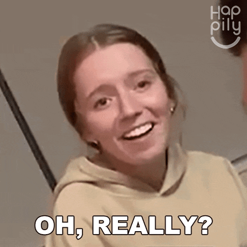 a woman says oh really while smiling and looking at the camera