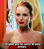 a woman in a red dress is saying " i 'm glad you 've come to your senses "