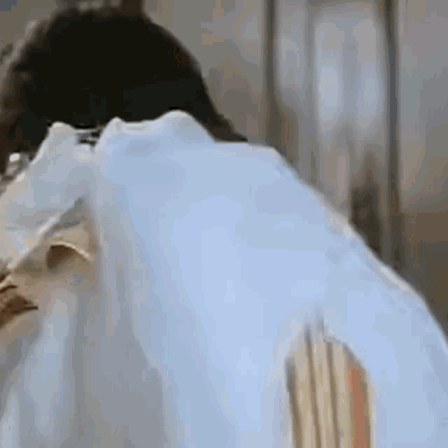 a close up of a person 's back covered in foam .