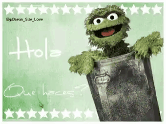 oscar the grouch is peeking out of a trash can with the word hola written on it