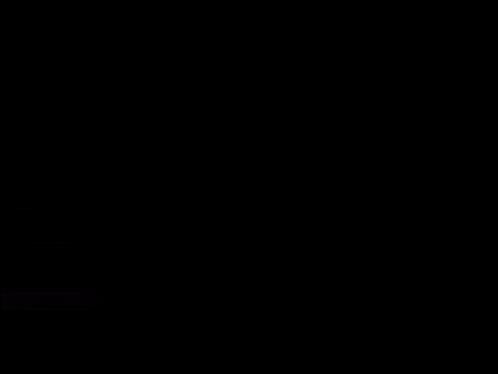 a heart shaped object in the middle of a dark space