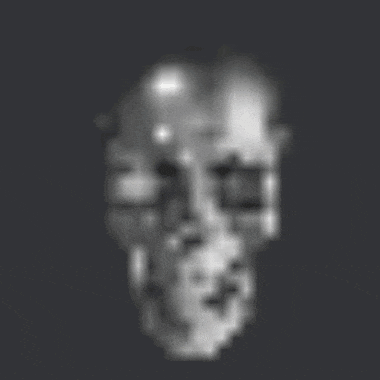 a black and white image of a skull on a dark background .
