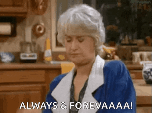 an older woman is sitting at a kitchen counter and says `` always & forevaaaa '' .