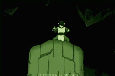 a cartoon character is jumping over a rock in a cave .