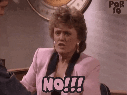 a woman in a pink suit says no !!