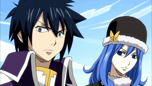 a man and a woman standing next to each other