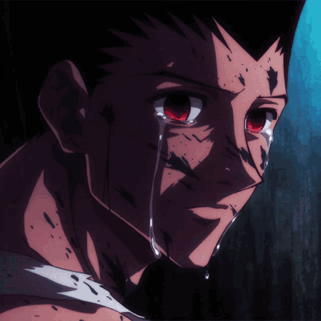 a close up of a person 's face with blood on it