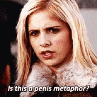 a close up of a woman 's face with the words `` is this a penis metaphor ? ''