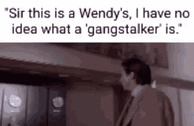a man in a suit and tie says " sir this is a wendy 's "