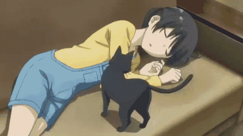 a girl is laying on a couch with a black cat .