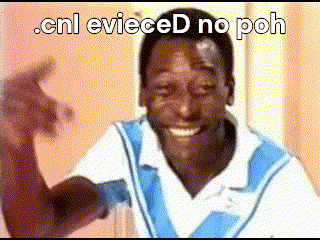 a man is smiling and making a funny face with the words .cnl eviced no poh written above him .