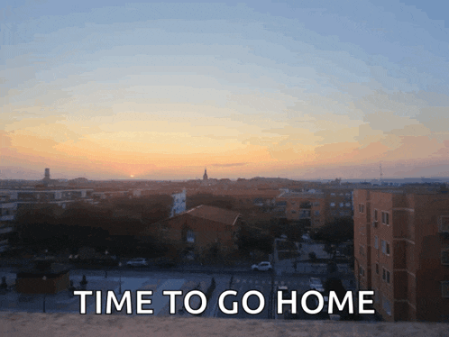 a sunset over a city with the words time to go home above it