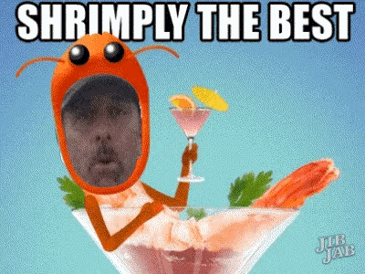 a man in a shrimp costume is holding a martini glass in a bowl of shrimp