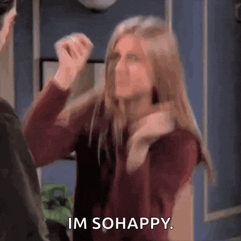 a woman is standing next to a man and making a funny face while saying `` im so happy '' .