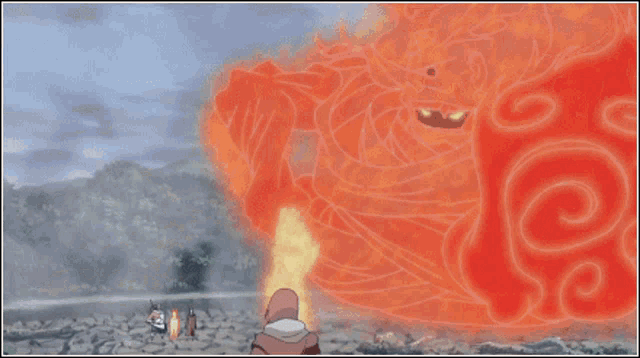 a man in a hooded cape stands in front of a fire