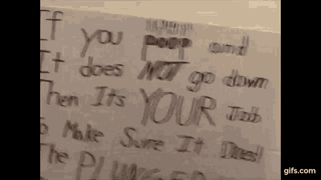 a piece of paper that says " if you poop and it does not go down then it 's your job "