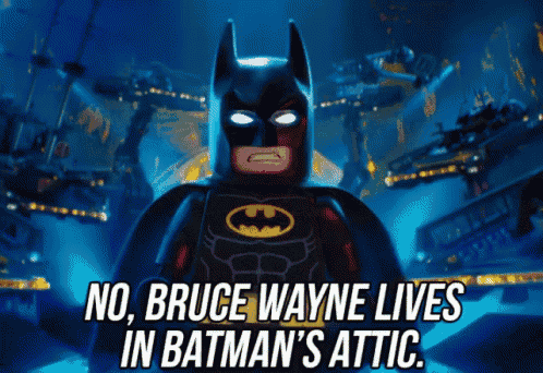 a picture of a lego batman with a caption that says no bruce wayne lives in batman 's attic