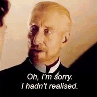 a man in a suit says oh i 'm sorry i hadn 't realised .
