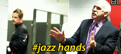 Joel Quenneville Jazz Hands GIF - Joel Quenneville Jazz Hands Chicago Blackhawks GIFs
