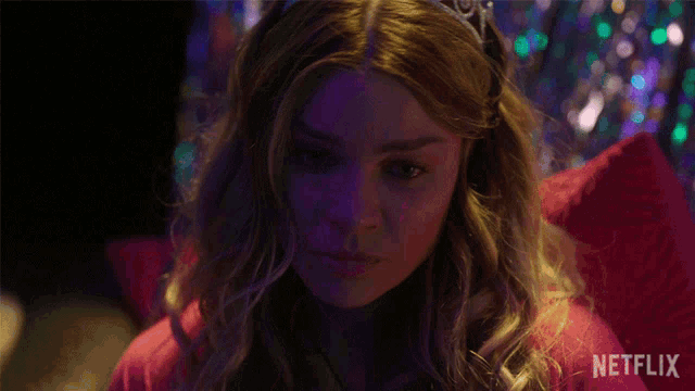 a close up of a woman 's face with netflix written on the bottom