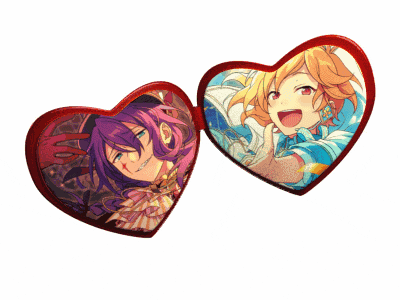 two hearts with a picture of two anime characters on them on a white background