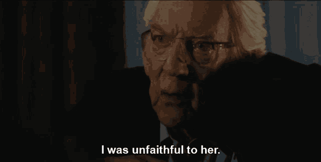 a man in a suit and tie is saying i was unfaithful to her
