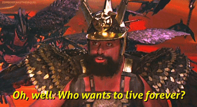 a man with a beard is wearing a helmet and wings and says oh well who wants to live forever