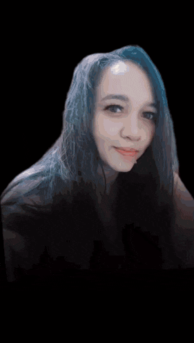 a woman with blue hair is surrounded by flames and smoke