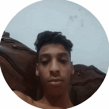 a young man taking a selfie in a round frame