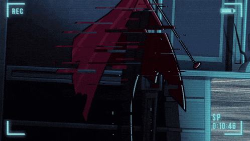 a video screen shows a red object and says rec at the top