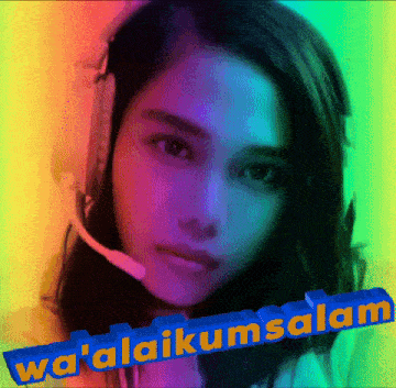 a woman wearing headphones and a microphone with the words wa ' alaikumsalam written below her