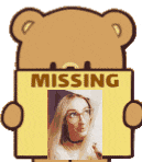 a teddy bear is holding a missing sign with a picture of a woman