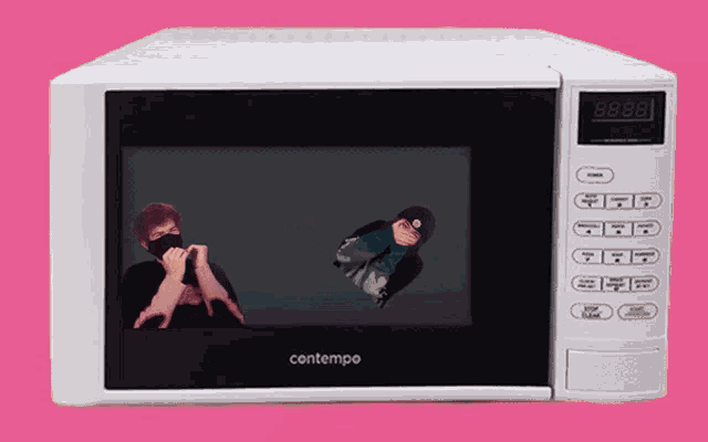 a white contempo microwave with a picture of a person on the screen