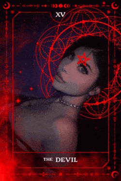 a tarot card shows a woman with a red star on her forehead and the word the devil on the bottom