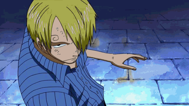 a man in a blue shirt is pointing his finger
