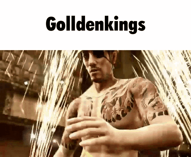 a man with a tattoo on his chest is standing in front of a fireworks display with the words golldenkings above him