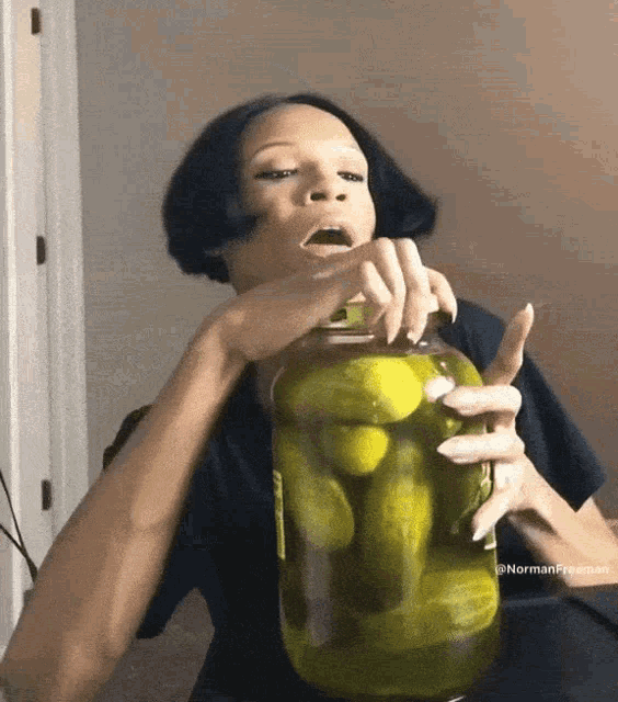 norman-freeman-asmr-pickle-eating-asmr-pickle-eating.gif