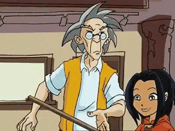 a man and a girl are standing next to each other in a room .