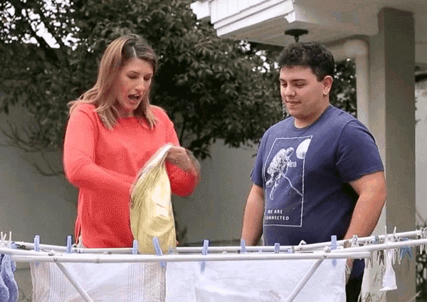 a man wearing a blue shirt that says we are connected