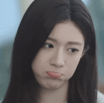a woman making a funny face with her tongue out