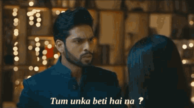 a man talking to a woman with the words tum unka beti hai na written below him