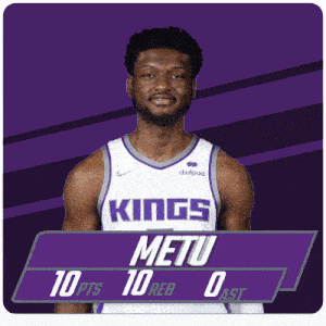 a king 's basketball player wearing a purple and white jersey