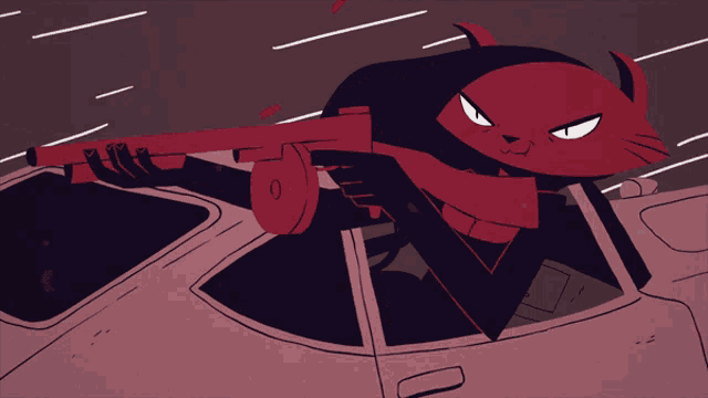 a red cat is holding a gun in a car