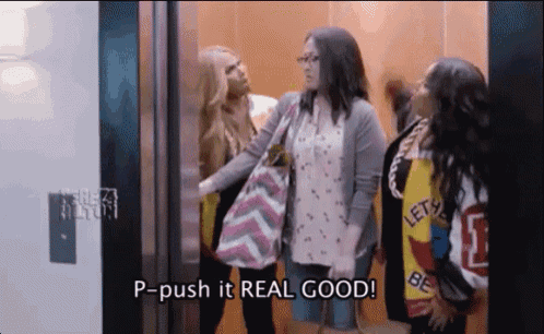 a group of women are standing in an elevator and one of them is saying p-push it real good