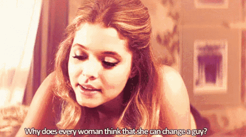 a woman laying on a bed with the words " why does every woman think that she can change a guy "