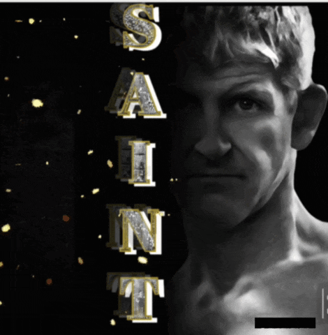 a black and white photo of a man with the words saint written in gold