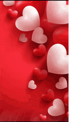 a bunch of red and white hearts on a red surface