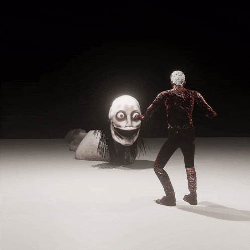 a man standing in front of a monster with a big smile on its face